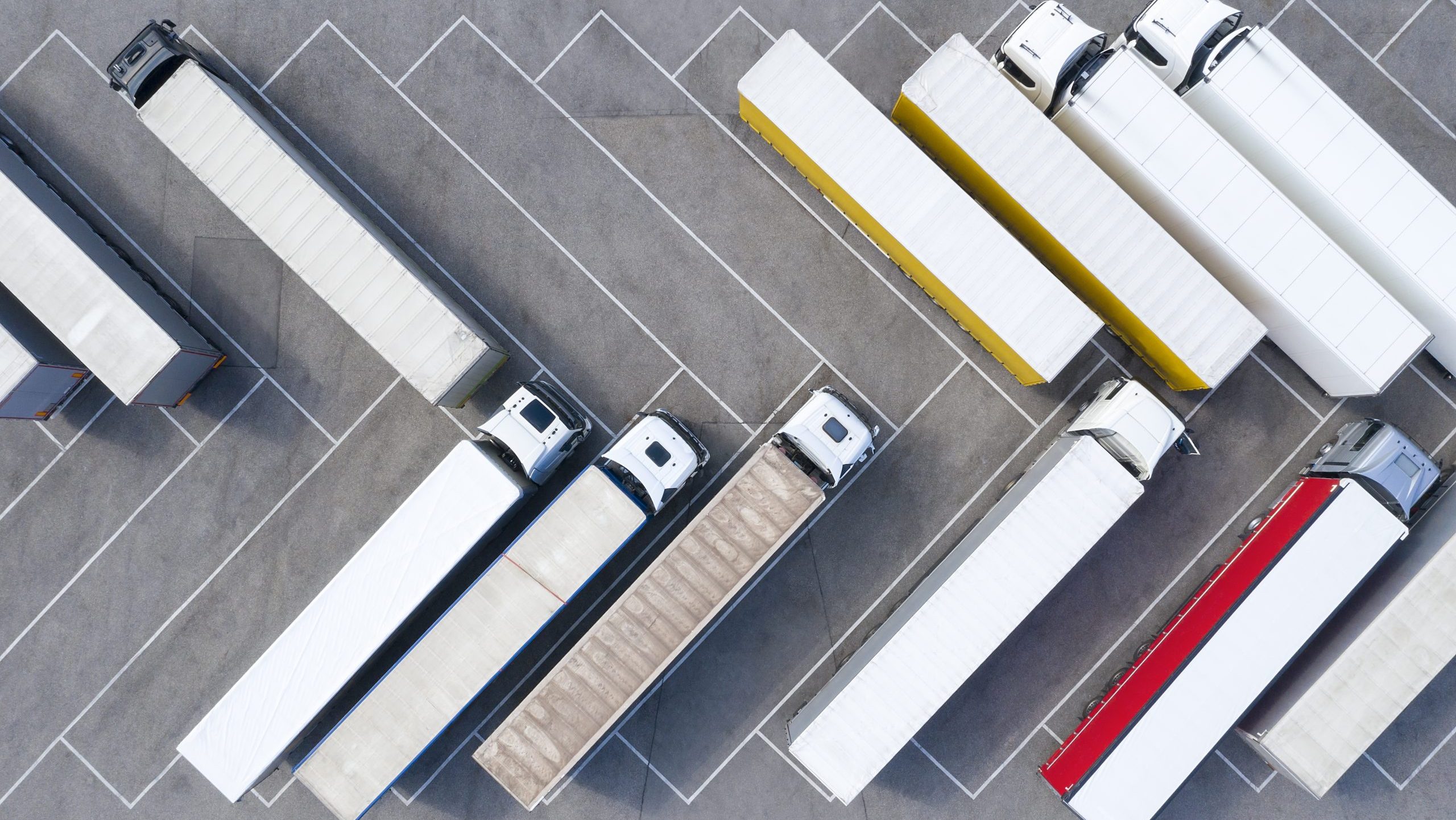 Large Group of Trucks at Truck Stop, Aerial View DOGUTRUCK D105121 - Image 1